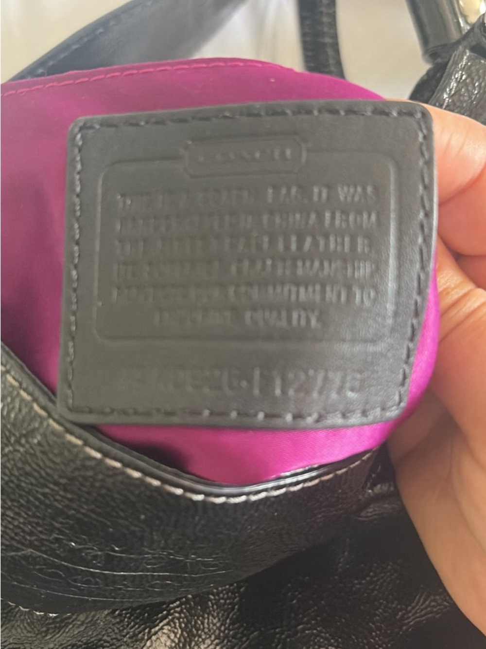 Coach Men’s Black Leather Backpack with Magenta Interior